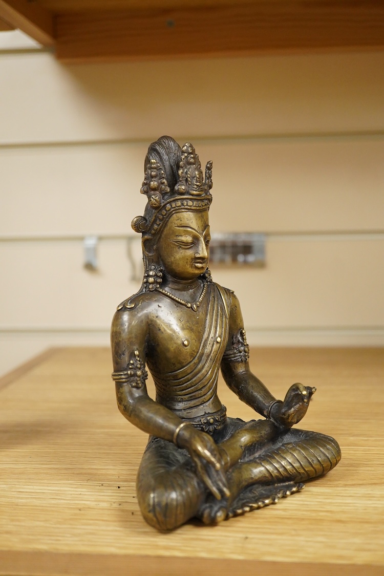 A Nepalese bronze seated figure of Avalokiteshvara, 19th century, 18cm high